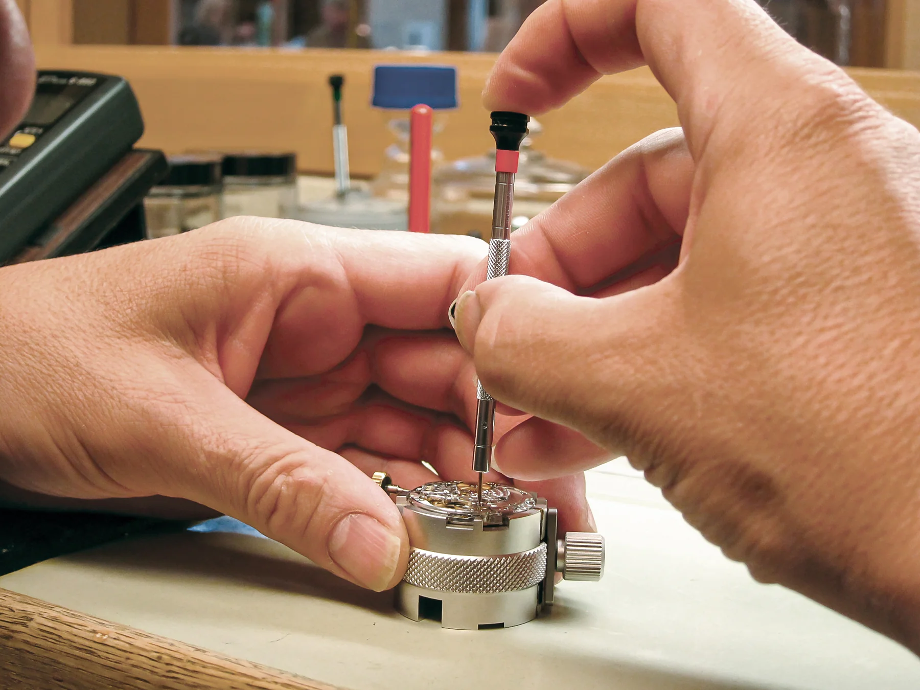 Mechanical watch movement components requiring precise inspection and servicing